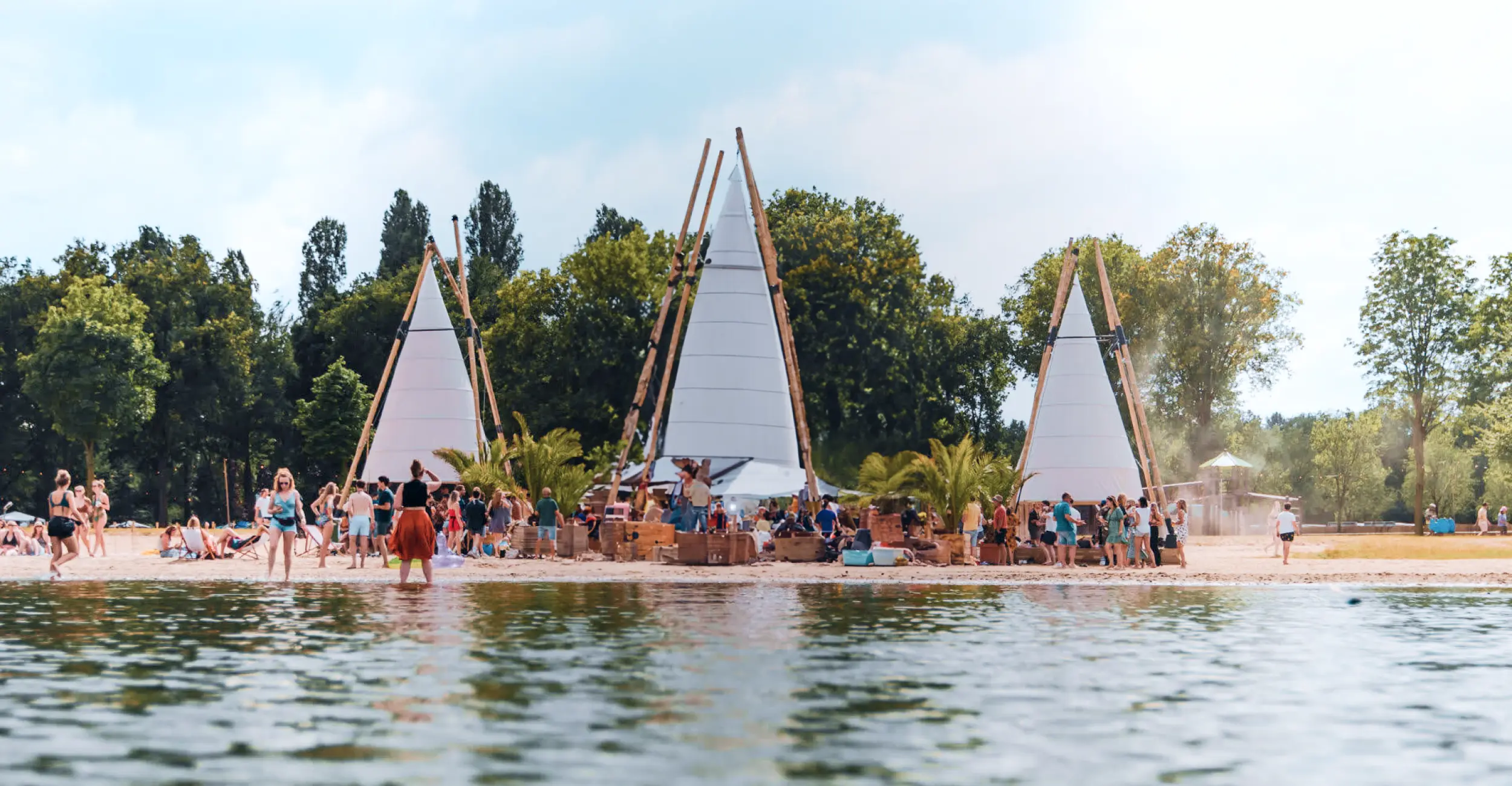 Beach with three tents